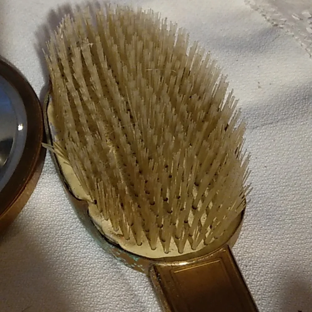Vintage vanity mirror and hairbrush